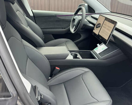 Серый Тесла Model Y, объемом двигателя 0 л и пробегом 2 тыс. км за 61900 $, фото 5 на Automoto.ua