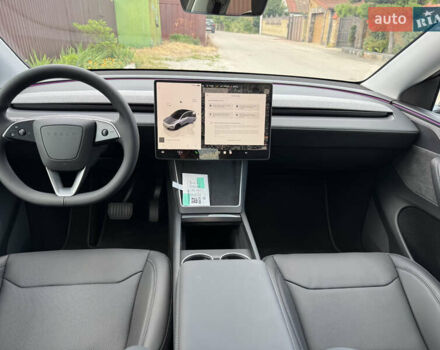 Серый Тесла Model Y, объемом двигателя 0 л и пробегом 2 тыс. км за 62500 $, фото 3 на Automoto.ua