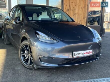 Серый Тесла Model Y, объемом двигателя 0 л и пробегом 81 тыс. км за 22099 $, фото 1 на Automoto.ua