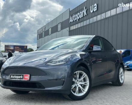 Серый Тесла Model Y, объемом двигателя 0 л и пробегом 77 тыс. км за 28490 $, фото 1 на Automoto.ua