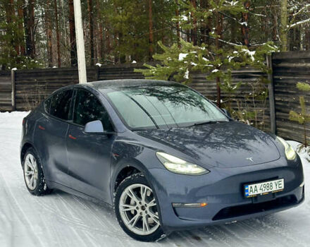 Серый Тесла Model Y, объемом двигателя 0 л и пробегом 76 тыс. км за 27000 $, фото 1 на Automoto.ua