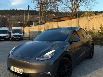 Сірий Тесла Model Y, об'ємом двигуна 0 л та пробігом 61 тис. км за 24999 $, фото 1 на Automoto.ua