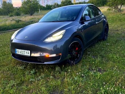 Серый Тесла Model Y, объемом двигателя 0.53 л и пробегом 75 тыс. км за 25900 $, фото 1 на Automoto.ua