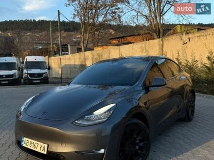 Серый Тесла Model Y, объемом двигателя 0 л и пробегом 31 тыс. км за 24999 $, фото 1 на Automoto.ua