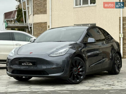 Серый Тесла Model Y, объемом двигателя 0 л и пробегом 53 тыс. км за 28000 $, фото 1 на Automoto.ua