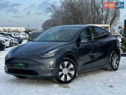 Серый Тесла Model Y, объемом двигателя 0 л и пробегом 32 тыс. км за 29590 $, фото 1 на Automoto.ua