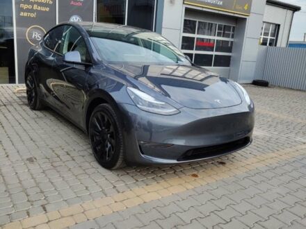Серый Тесла Model Y, объемом двигателя 0 л и пробегом 50 тыс. км за 27000 $, фото 1 на Automoto.ua