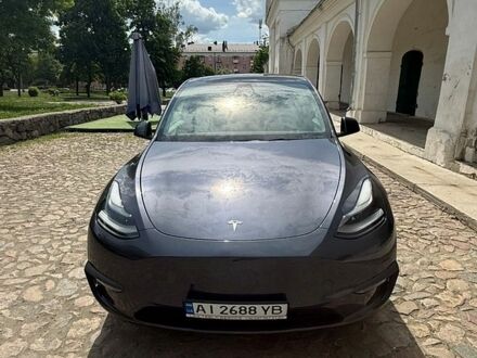 Серый Тесла Model Y, объемом двигателя 0 л и пробегом 78 тыс. км за 24999 $, фото 1 на Automoto.ua