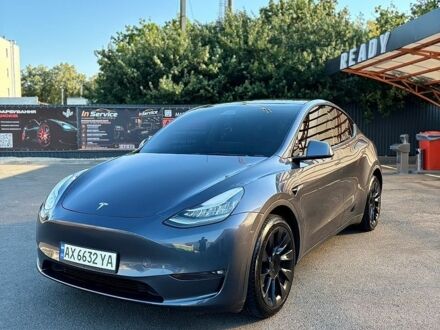 Серый Тесла Model Y, объемом двигателя 0 л и пробегом 55 тыс. км за 29000 $, фото 1 на Automoto.ua