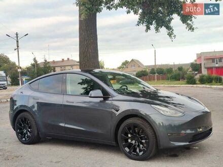 Серый Тесла Model Y, объемом двигателя 0 л и пробегом 91 тыс. км за 24700 $, фото 1 на Automoto.ua