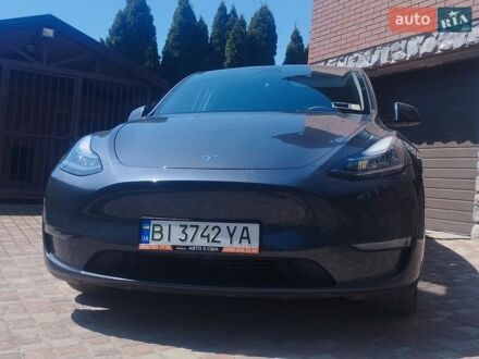 Серый Тесла Model Y, объемом двигателя 0 л и пробегом 30 тыс. км за 26300 $, фото 1 на Automoto.ua