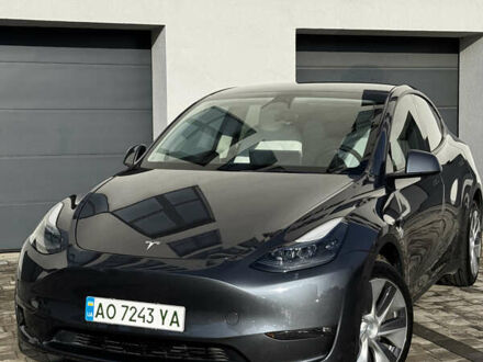 Серый Тесла Model Y, объемом двигателя 0 л и пробегом 53 тыс. км за 29900 $, фото 1 на Automoto.ua