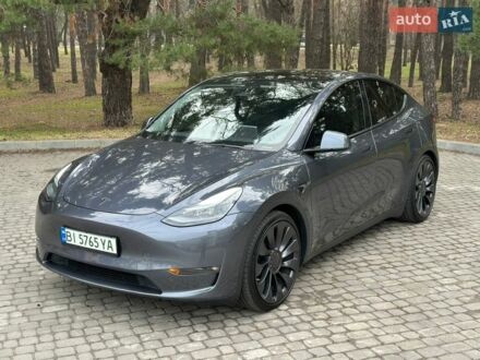 Серый Тесла Model Y, объемом двигателя 0 л и пробегом 42 тыс. км за 27900 $, фото 1 на Automoto.ua