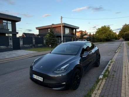 Серый Тесла Model Y, объемом двигателя 0 л и пробегом 64 тыс. км за 28100 $, фото 1 на Automoto.ua