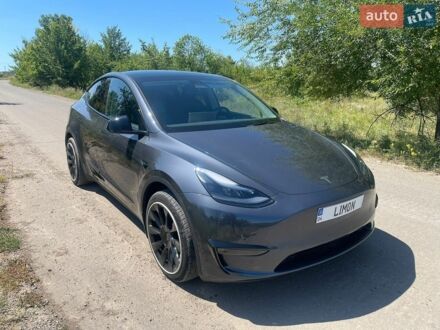 Серый Тесла Model Y, объемом двигателя 0 л и пробегом 51 тыс. км за 27000 $, фото 1 на Automoto.ua