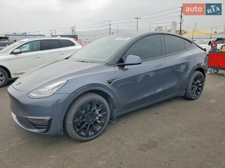 Серый Тесла Model Y, объемом двигателя 0 л и пробегом 66 тыс. км за 11400 $, фото 1 на Automoto.ua