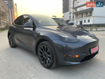 Серый Тесла Model Y, объемом двигателя 0 л и пробегом 23 тыс. км за 34700 $, фото 1 на Automoto.ua