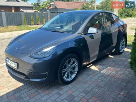 Серый Тесла Model Y, объемом двигателя 0 л и пробегом 42 тыс. км за 26200 $, фото 1 на Automoto.ua