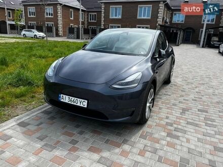Серый Тесла Model Y, объемом двигателя 0 л и пробегом 81 тыс. км за 28100 $, фото 1 на Automoto.ua