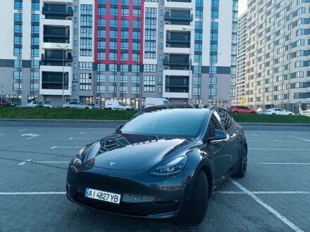 Серый Тесла Model Y, объемом двигателя 0 л и пробегом 53 тыс. км за 23990 $, фото 1 на Automoto.ua