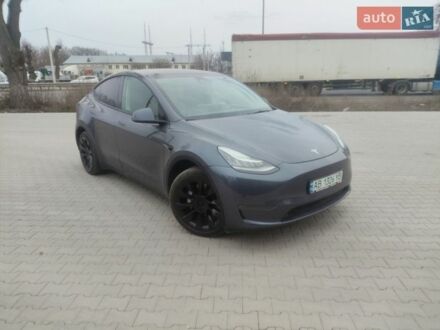 Серый Тесла Model Y, объемом двигателя 0 л и пробегом 106 тыс. км за 25000 $, фото 1 на Automoto.ua