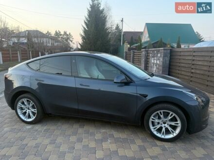 Серый Тесла Model Y, объемом двигателя 0 л и пробегом 20 тыс. км за 26600 $, фото 1 на Automoto.ua