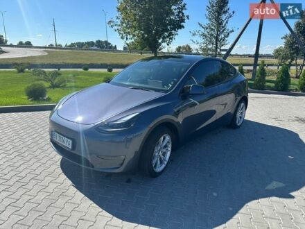 Серый Тесла Model Y, объемом двигателя 0 л и пробегом 54 тыс. км за 26500 $, фото 1 на Automoto.ua