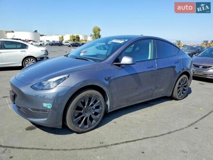 Серый Тесла Model Y, объемом двигателя 0 л и пробегом 98 тыс. км за 11000 $, фото 1 на Automoto.ua