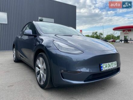 Серый Тесла Model Y, объемом двигателя 0 л и пробегом 54 тыс. км за 26500 $, фото 1 на Automoto.ua