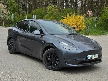 Сірий Тесла Model Y, об'ємом двигуна 0 л та пробігом 54 тис. км за 27999 $, фото 1 на Automoto.ua