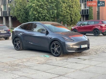 Серый Тесла Model Y, объемом двигателя 0 л и пробегом 51 тыс. км за 25650 $, фото 1 на Automoto.ua