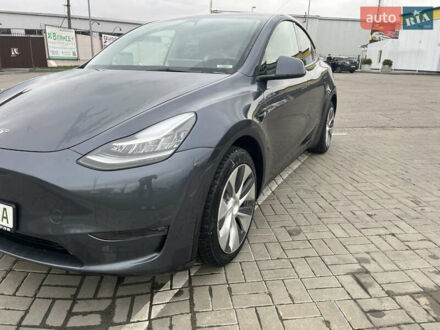 Серый Тесла Model Y, объемом двигателя 0 л и пробегом 56 тыс. км за 28001 $, фото 1 на Automoto.ua