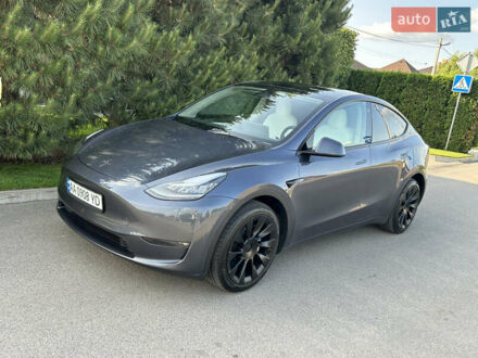 Серый Тесла Model Y, объемом двигателя 0 л и пробегом 55 тыс. км за 29500 $, фото 1 на Automoto.ua