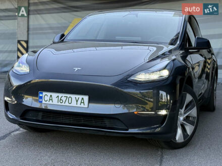 Серый Тесла Model Y, объемом двигателя 0 л и пробегом 23 тыс. км за 29800 $, фото 1 на Automoto.ua