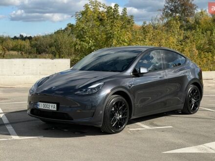 Серый Тесла Model Y, объемом двигателя 0 л и пробегом 21 тыс. км за 29000 $, фото 1 на Automoto.ua