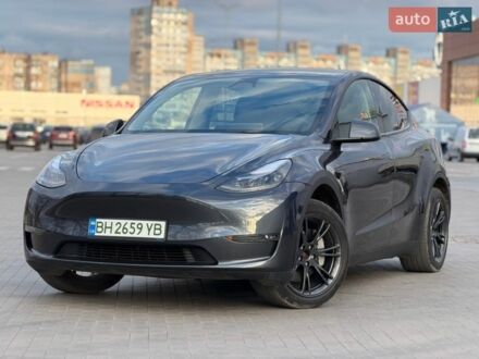 Серый Тесла Model Y, объемом двигателя 0 л и пробегом 27 тыс. км за 29900 $, фото 1 на Automoto.ua
