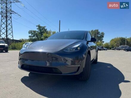 Серый Тесла Model Y, объемом двигателя 0 л и пробегом 22 тыс. км за 30900 $, фото 1 на Automoto.ua