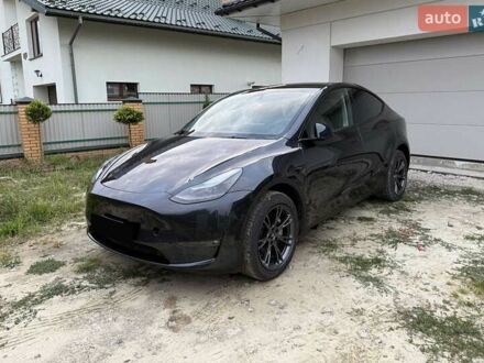 Серый Тесла Model Y, объемом двигателя 0 л и пробегом 23 тыс. км за 24999 $, фото 1 на Automoto.ua