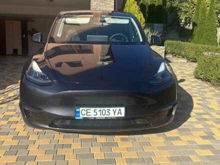 Серый Тесла Model Y, объемом двигателя 0 л и пробегом 65 тыс. км за 27500 $, фото 1 на Automoto.ua