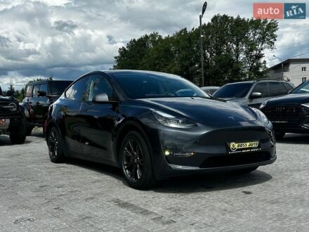 Серый Тесла Model Y, объемом двигателя 0 л и пробегом 20 тыс. км за 27600 $, фото 1 на Automoto.ua