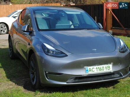 Серый Тесла Model Y, объемом двигателя 0 л и пробегом 27 тыс. км за 24500 $, фото 1 на Automoto.ua