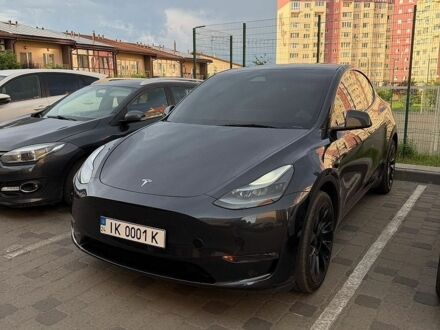 Серый Тесла Model Y, объемом двигателя 0 л и пробегом 22 тыс. км за 33000 $, фото 1 на Automoto.ua