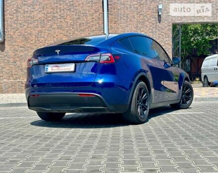 Синій Тесла Model Y, об'ємом двигуна 0 л та пробігом 80 тис. км за 31999 $, фото 11 на Automoto.ua