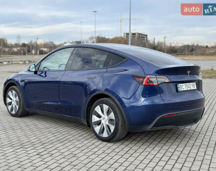 Синий Тесла Model Y, объемом двигателя 0 л и пробегом 83 тыс. км за 23800 $, фото 5 на Automoto.ua