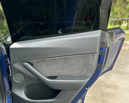 Синий Тесла Model Y, объемом двигателя 0 л и пробегом 57 тыс. км за 22700 $, фото 20 на Automoto.ua
