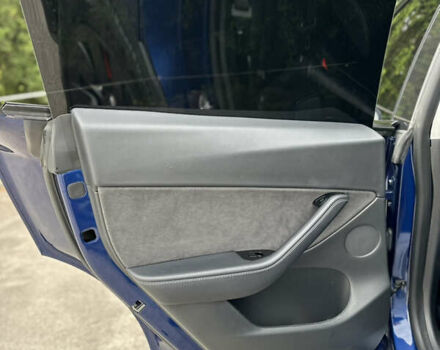 Синий Тесла Model Y, объемом двигателя 0 л и пробегом 57 тыс. км за 22700 $, фото 25 на Automoto.ua