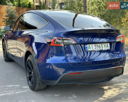 Синий Тесла Model Y, объемом двигателя 0 л и пробегом 94 тыс. км за 24000 $, фото 1 на Automoto.ua