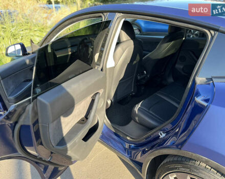 Синий Тесла Model Y, объемом двигателя 0 л и пробегом 75 тыс. км за 25000 $, фото 20 на Automoto.ua