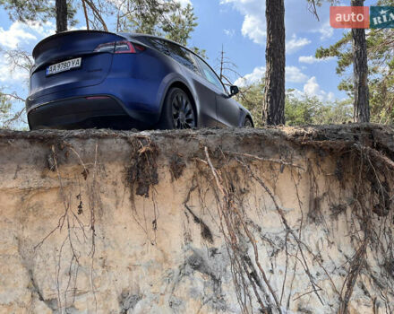 Синий Тесла Model Y, объемом двигателя 0 л и пробегом 75 тыс. км за 25000 $, фото 2 на Automoto.ua