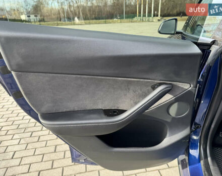 Синий Тесла Model Y, объемом двигателя 0 л и пробегом 83 тыс. км за 23800 $, фото 25 на Automoto.ua